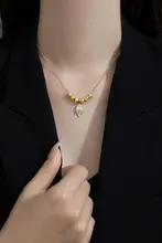 洗練されたデザイン！金色の枝葉モチーフネックレス【ステンレス製・華やかさを引き立てる】