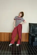 したカジュアルなデザイン！ロゴ入り短袖Tシャツとサイドストライプのワイドパンツ（セットアップ対応）