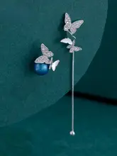 不対称バタフライ風デザインの仿真パールイヤリング【ピアス・純銀製】