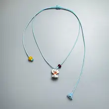 ブルーのレザーコードのドパミン小犬ネックレス【可愛いデザイン・引き伸ばし式・ロングスタイル】