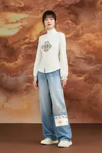 民族風刺繍が施された冬用フリース入りストレートデニムパンツ