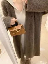 ゆったりとしたデザインのニットカーディガン【秋冬用・厚手・レディース・ミディ丈】