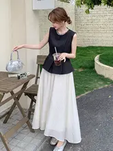 黒のノースリーブウエスト絞りトップスと白のハイウエストスカート【上品な女性向け・絶妙なコーディネート】（セットアップ対応）