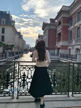 ドレープ感のある黒の不規則Aラインスカート【秋用・ハイエンドデザイン・大きいサイズ】