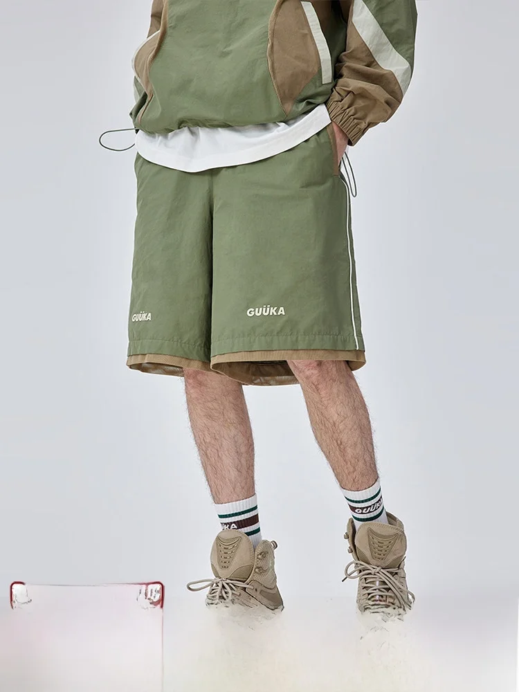 タクティカル パンツの実用性を検証：軍グリーンワイドシルエットカーゴショートパンツの機能とシーン別適用