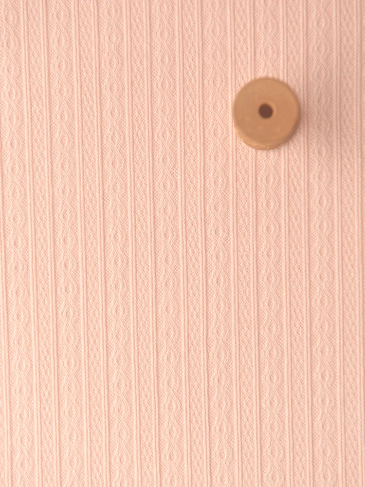 ピンクのジャカードストリップニットポリコットン生地：コットン素材とセルロース服の実用性を検証