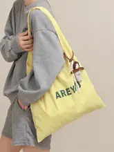 大容量トートバッグ【キャンバス素材・防水・肩掛け・ロゴプリント】