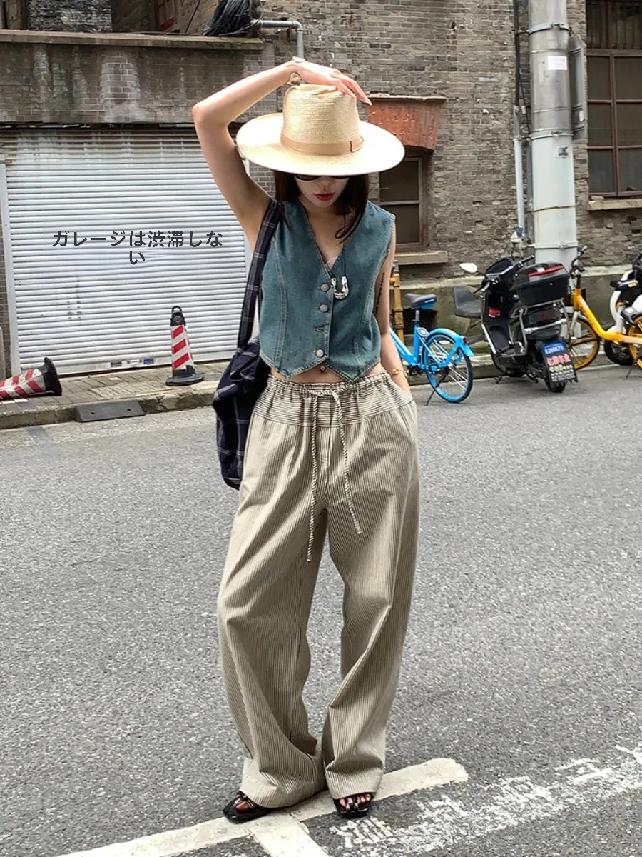 ストライプワイドパンツの着こなしと実用性：小小拉のハイウエスト  ドローストリングモデルを徹底解説