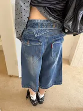 デザイン性の高いハーフ丈デニムパンツ【ユニセックス・ウォッシュ加工・膝上丈】