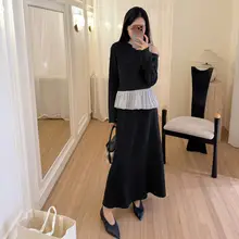 デザイン性のあるバイカラーのリボン付きトップスと優雅なフレンチスタイルのスカート（セットアップ対応）