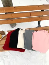 感あふれるデザインの黒いニットトップス【秋冬用・長袖・大きいサイズ】