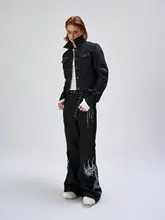 印花装飾デザインのデニムパンツ【微喇ジーンズ・カジュアルスタイル】