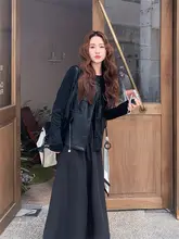 高級感あふれる黒のレザーベストとスカートのコーディネート【春秋用・個性的デザ イン】（セットアップ対応）