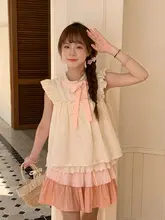 夏にぴったりな美しいフレアスリーブトップスとピンクの切り替えスカート（セットアップ対応）