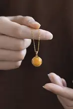 天然琥珀の蜜蝋ペンダントトップ【ロシア製・純銀・軽奢華】