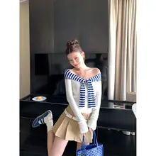 デザイン感あふれる撞色ストライプリボンデザインニットトップス