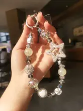 個性的なスマホ用ストラップ【ビーズ・スワロフスキー・星モチーフ・DIY手作り】