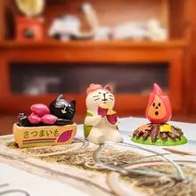 焼き芋を持つ可愛い猫の置物【鈴付き・車載装飾用】