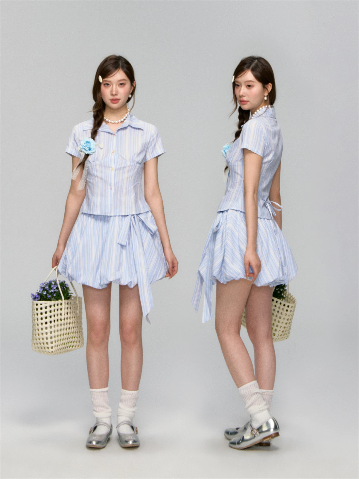 夏っぽい服ってどう選ぶ？ストライプとフラワーリボンが融合したセットアップが、なぜ今夏の定番になっているのか