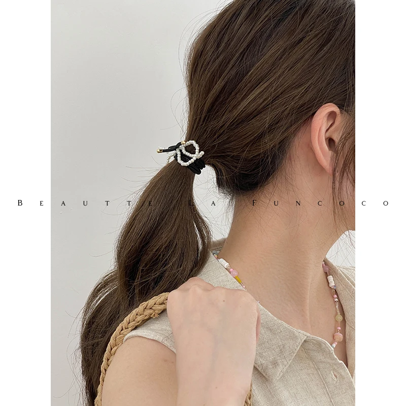 かぎ針で編むリボン小物の実用性：パールリボン付き高弾性ヘアゴムの使い方と性能解析