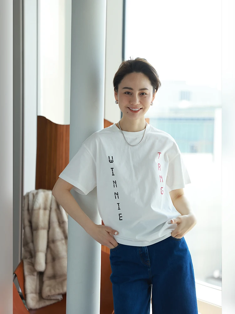 通勤の疲れを一瞬で和らげる？WinnieTangの四周年記念Tシャツが本当に効果的なのか？