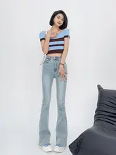 ハイウエストデニムパンツ【伸縮性・フリンジ仕上げ・浅いブルー・微フレア】