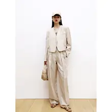 アシンメトリーなデザインのリネン混合素材スーツ風ワイドパンツ（セットアップ対応）