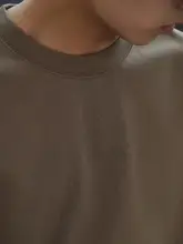 ヴィンテージ風 バックプリン  トデザインのゆったりショートスリーブTシャツ