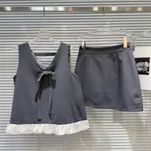 気品あふれるパールリボンピン付きキャミソールと無地ショートスカート（セットアップ対応）