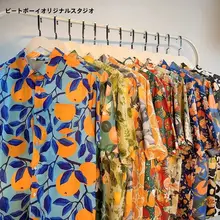 リゾート風フルーツオレンジプリントの短袖シャツ【ユニセックス・ルーズフィット・夏用】