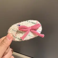 少女向け毛素材のピンク色リボンヘアクリップ【かわいい・甘いデザイン・前髪用】