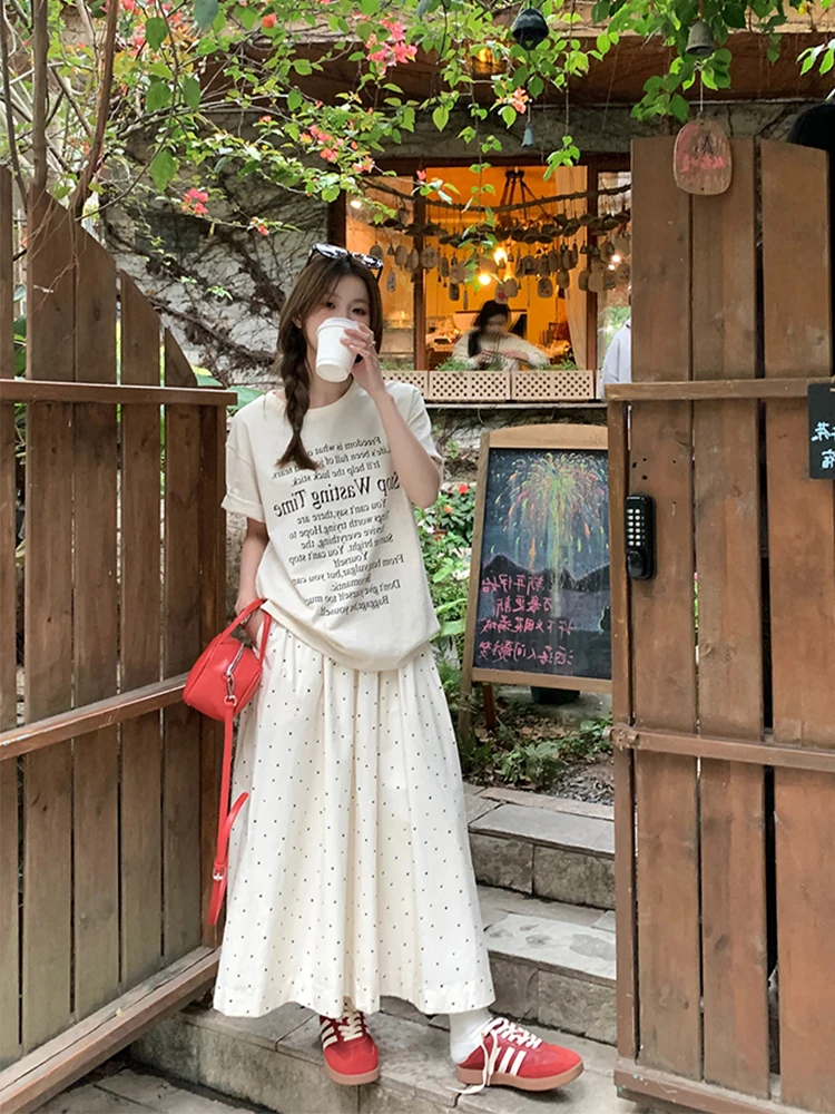 白ドットデザインのAラインスカート：中長丈で梨型体型に最適な夏用通勤スカート