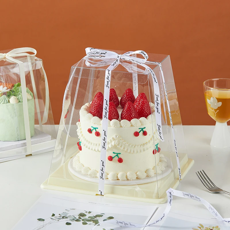 透明な異形デザインの子供用誕生日ケーキボックス：バレンタイン・リボン装飾でバイキングテーマを実現