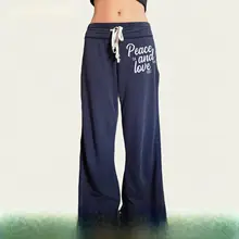 アメリカンヴィンテージ風ブルーリボン付き字母プリントニットパンツ【スポーツスタイル・ゆったりストレート】