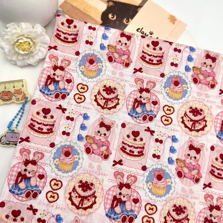 カートゥーンうさぎケーキプリントコットン生地【ハンドメイドブックカバー・バッグ用・布幅広】