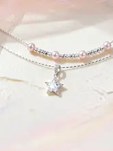 パールと星のデザインが特徴的なダブルレイヤー鎖骨チェーン【小ぶりで高級感】