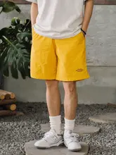 夏季カジュアルなゆったりデザインの速乾防水ビーチショートパンツ（セットアップ対応）