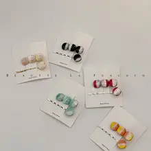 猫目型デザインの二色バンスクリップ【前髪用・上品で精細】