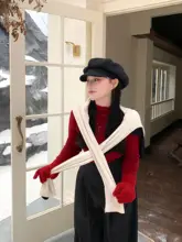 感あふれるデザインの黒いニットトップス【秋冬用・長袖・大きいサイズ】