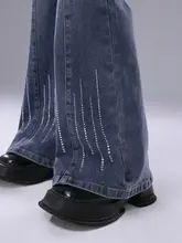 星落雲ブルーのスリムフィットデニムパンツ【スワロフスキー付き・フレアデザイン】