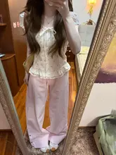 白地に花柄のラウンドネックリボン付きショートスリーブシャツ【パフスリーブ・スリムフィット】