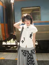 音符刺繍の白いドールカラートップス【夏用・短袖・レディース】