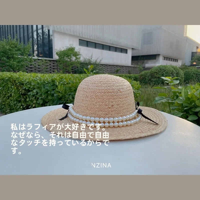 パール付きリボンデザインのラフィア草編みハット：アウトドアで女性に人気の夏用日よけアイテム