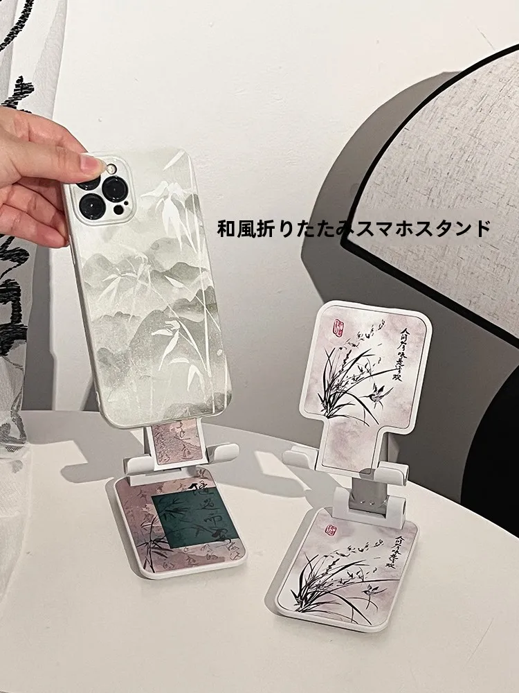 新中式スマートフォンスタンド：調整可能・国風デザインで快適なデスク環境を実現