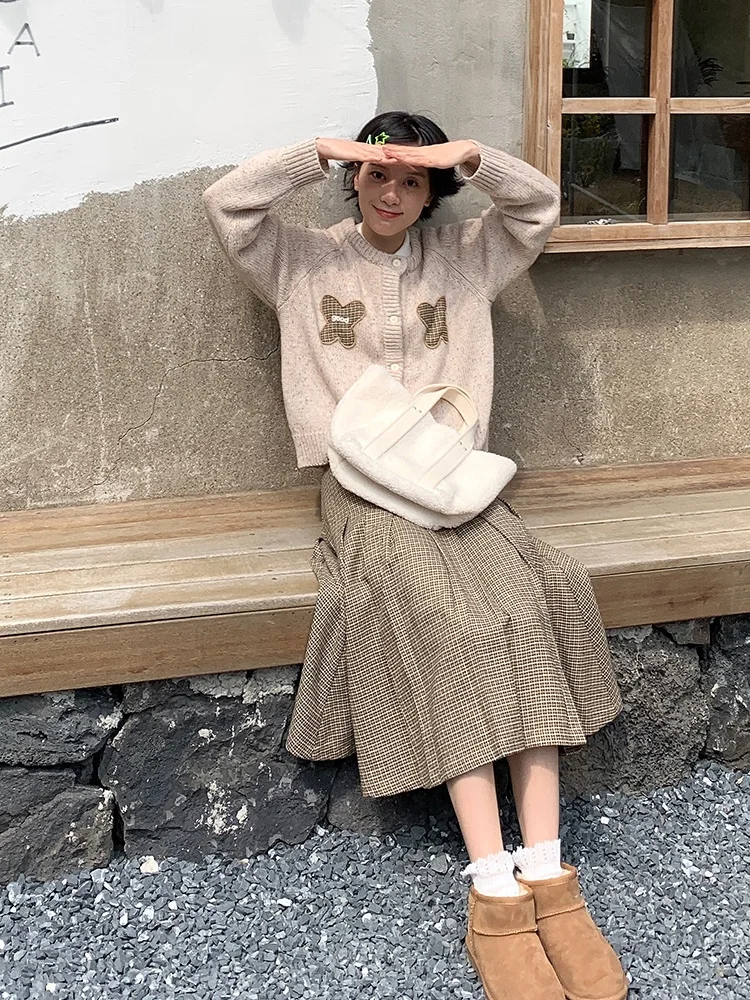 プリーツスカート コーデ 完全ガイド｜千鳥格子とトップスの相性を徹底解説