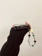 折りたたみ式スマホケース【カラフルなボタンデザイン・ユニークなビーズストラップ付き】