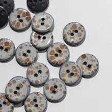 光沢感あるブルーのグラデーション不規則模様のボタン【イギリス製・直径15mm】