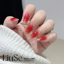 手作りの紅色グラデーションネイルチップ【猫目デザイン・スワロフスキー付き・お正月用】