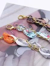 高級感ある細腰チェーンウエストベルト【ボヘミアンスタイル・金属リボン装飾】