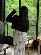 着回しに便利な黒いニットカーディガン【短丈・ルーズフィット・大サイズ・国風】